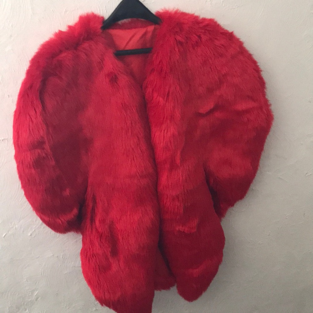 Brand new faux fur fiery red cape.